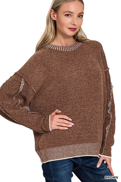 Exposed seam chenille sweater